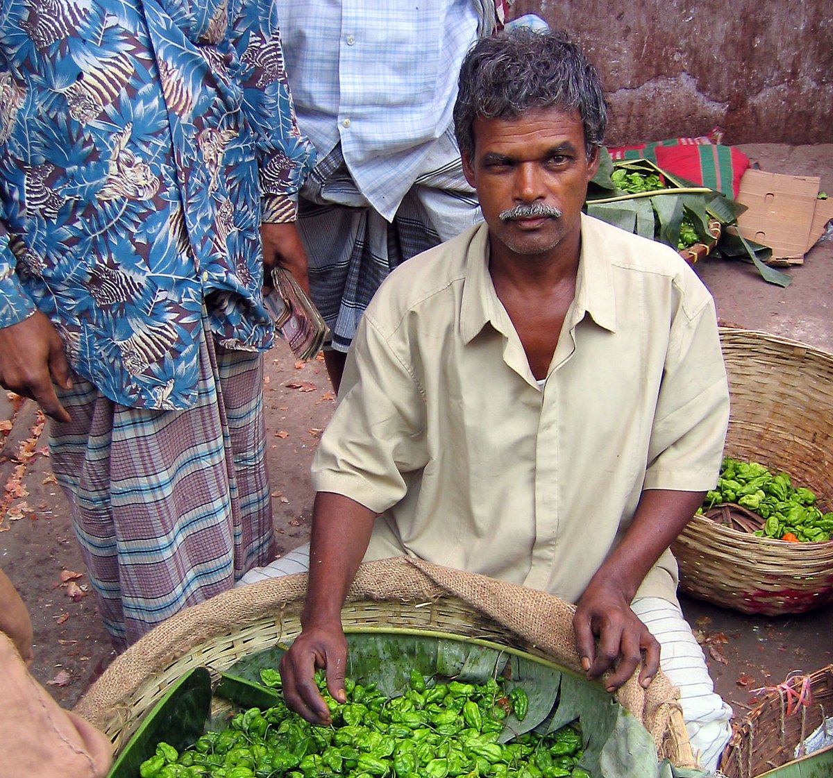 Торговец на рынке Бангладеш